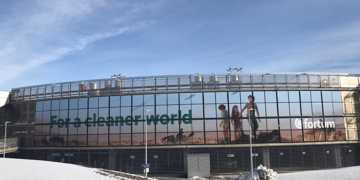 Composite panel ads on Helsinki Vantaa airport buildings